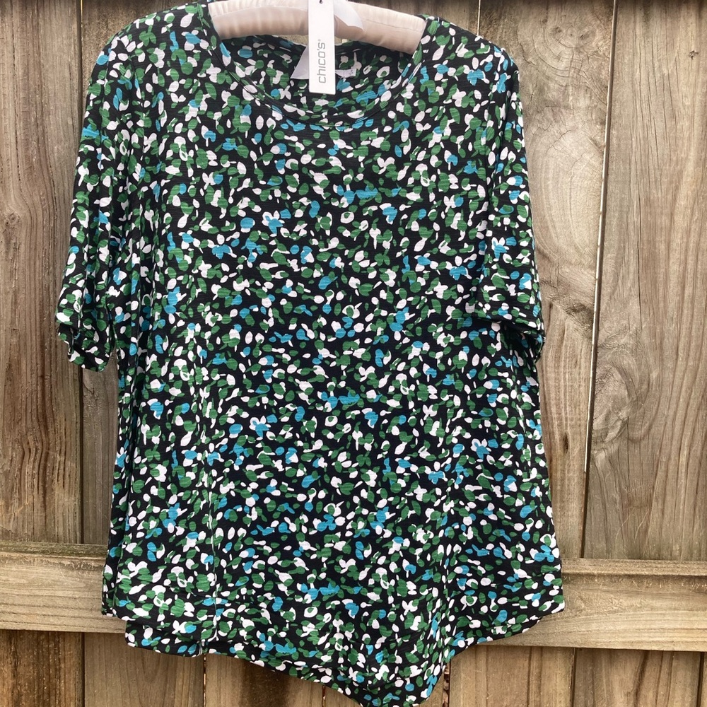 Chico’s black asymmetrical hem top